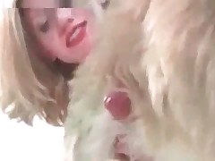 Accurate blonde is wanking dog's prick