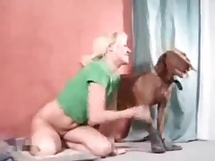 Blonde has sex with her cute doggy