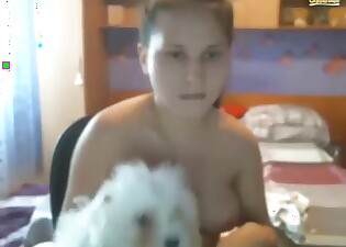 White dog is getting sucked off by a brunette
